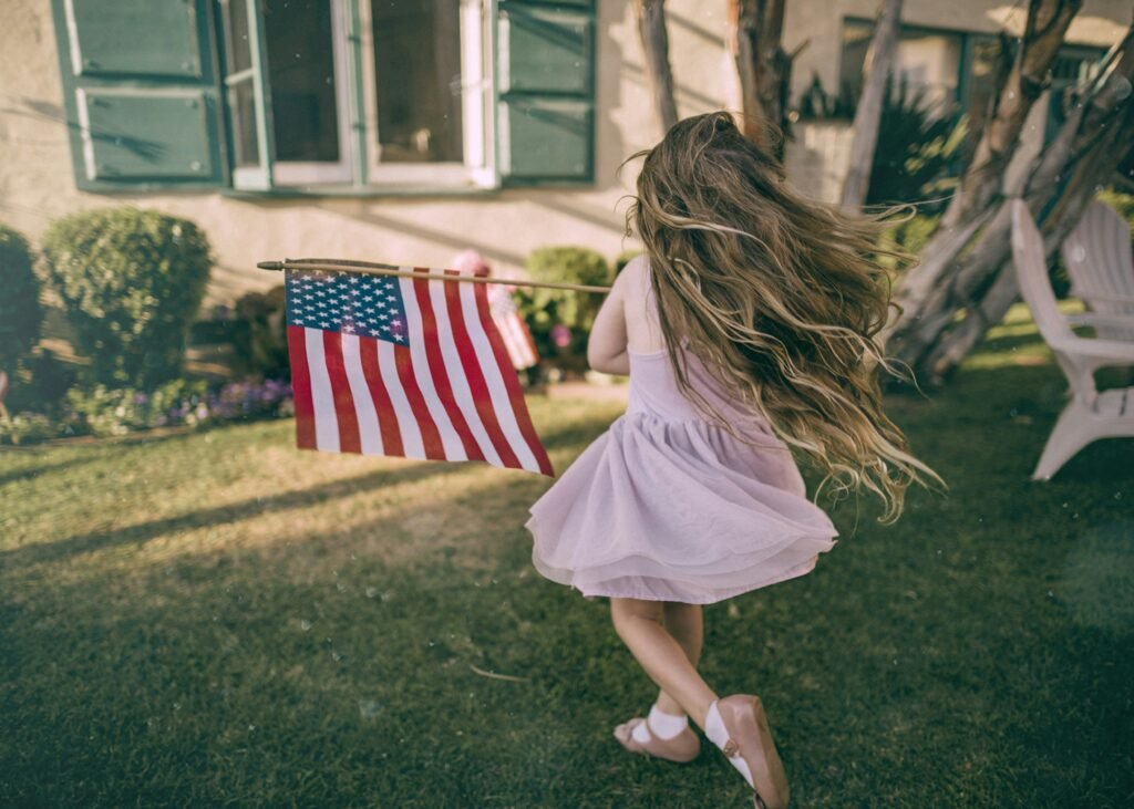 Running girl with an American Flag